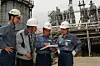 SK Innovation employees are seen in a plant in an undated photo. [JOONGANG ILBO]