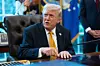 U.S. President Donald Trump gives remarks to the media as he signs an executive order in the Oval Office of the White House in Washington on March 16. [EPA/YONHAP]
