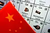 China's flag is placed next to the elements of Gallium and Germanium on a periodic table, in this illustration created on July 6, 2023. [REUTERS/YONHAP]
