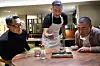 Korean American actor Daniel Dae Kim, far left, listens to Kang Min-goo, chef of the Michelin three-star restaurant Mingles, center, and chef Corey Lee of Benu, a Michelin three-star restaurant in San Francisco, explain dishes at the restaurant in Seoul in an episode of the CNN travel show ″K-Everything″ [CNN]