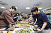 Kangwon National University students take food at the 2,000-won dinner program that was offered at the university in 2025. [KANGWON NATIONAL UNIVERSITY]