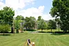 The diamond-shaped masses of Erdman Hall, a dormitory at Bryn Mawr College, extend through the trees, quietly blending into the surrounding landscape. [LIM YEONG-HWAN]