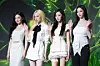 Girl group aespa poses for photos during a press conference for the release of its second full-length album “Lemonade” at Sofitel Ambassador Seoul Hotel in southern Seoul on May 28. [DANIELA GONZALEZ PEREZ]