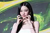 aespa’s Karina poses for photos during a press conference for the release of the group’s second full-length album “Lemonade” at Sofitel Ambassador Seoul Hotel in southern Seoul on May 28. [DANIELA GONZALEZ PEREZ]