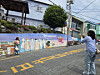 Tourists take a picture with a BTS mural at Gamcheon Culture Village in Busan on May 26. [JIN EUN-SOO]