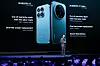 Xiaomi product launch stage with large smartphone graphics and a presenter beside the screen.