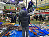 A vendor sells fish at Mangwon World Cup Market in Mapo District, western Seoul, on March 23. [HAN CHAN-WOO]