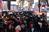 Pedestrians crowd the streets of Myeongdong in central Seoul on Dec. 25, 2025. [YONHAP]