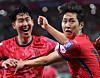 Lee Kang-in, right, celebrates a goal with Son Heung-min during a match against China at Seoul World Cup Stadium in western Seoul on June 11, 2024. [NEWS1]
