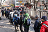 Older people line up to receive a free meal in central Seoul on New Year's Day in 2024. [NEWS1]