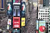 Protesters descend on Times Square during the ″No Kings″ national day of protest in New York on March 28. [AFP/YONHAP]