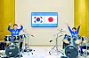 Korean President Lee Jae Myung, left, and Japanese Prime Minister Sanae Takaichi play drums together following their bilateral summit in Nara Prefecture, Japan, on Jan. 13. [JOINT PRESS CORP]