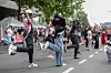 Fans dance outside the Stade de France stadium prior to a concert by girl group Blackpink in Saint-Denis, in the northern outskirts of Paris, on Aug. 2, 2025. [AFP/YONHAP]