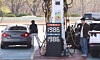 Car owners pump gas at a gas station in Seoul on April 12. [YONHAP]
