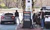 Car owners pump gas at a gas station in Seoul on April 12. [YONHAP]