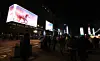 People watch a countdown show on digital displays near Gwanghwamun Square in Jongno District, central Seoul, on Jan. 1. [YONHAP]