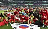 Korean players celebrate winning their Group H match against Portugal at the FIFA World Cup in Doha, Qatar, in 2022. [EPA/YONHAP]