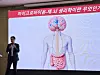 Suh Seong-Bae, the director of the Institute for Basic Science's Center for Microbiome and Body-Brain Physiology, explains the team's research findings in Gwanghwamun, central Seoul, on May 21. [IBS]