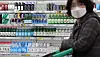Bottles of soju are displayed at a supermarket in Seoul on Feb. 26, 2023. [YONHAP]