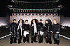 Boy band BTS poses for a photo in front of Gwanghwamun gate in central Seoul during its March 21 performance in the area, marking its fifth full-length album 'Arirang.' [BIGHIT MUSIC/NETFLIX]