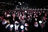 Fans cheer during the 'BTS the Comeback Live: Arirang' performance held at Gwanghwamun Square in central Seoul on March 21. [AP/YONHAP]