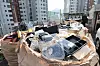 Recyclable garbage piles up outside an apartment complex in Seoul on Feb. 18. [YONHAP]