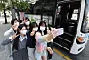 Students at Seonjeong International Tourism High School in Eunpyeong District, northern Seoul, take photos with their phones before departing on a school trip, May 2, 2022. [YONHAP]