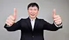 Vietnam national football team head coach Kim Sang-sik poses with both thumbs up at the JoongAng Ilbo headquarters in Mapo District, western Seoul, on Jan. 13, 2025. [KANG JUNG-HYUN]