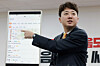 Reform Party leader Lee Jun-seok explains about its AI campaign manager application at the National Assembly on March 9. [YONHAP]
