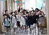 Students leave Maesan Elementary School in Paldal District, Suwon, Gyeonggi, after a summer break ceremony. [YONHAP]