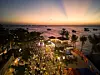The vibrant nightscape of Sunset Town [SUN GROUP]