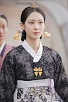 Gong Seung-yeon as Queen Dowager Yoon Yi-rang wears a sequinned jeogori (upper garment) and skirt in romantic comedy series ″Perfect Crown″ [MBC]