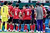 Korean footballers and their head coach discuss strategies at a FIFA World Cup 2026 match against the Czech Republic held in Mexico on June 11.