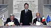 Korean President Lee Jae Myung, center, stands during a signing event for bilateral cultural exchange in Italy on June 13.