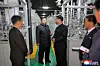 North Korean leader Kim Jong-un, second from left, inspects a plant producing materials for nuclear weapon in a photo carried by the Korean Central News Agency on June 4.