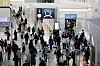 Air travelers enter walks near departure checkpoints at Incheon International Airport on Jan. 20, 2023.