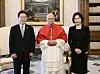 President Lee Jae Myung, left, and first lady Kim Hea Kyung, right, pose for a photograph with Pope Leo XIV in Vatican on June 15.