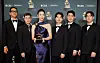 EJAE, third from left, and music production crew members pose with the Best Song Written For Visual Media award for 'Golden' from KPop Demon Hunters during the 68th Annual Grammy Awards in Los Angeles on Feb. 1.