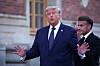 U.S. President Donald Trump speaks as he arrives to attend a dinner hosted by French President Emmanuel Macron and his wife, Brigitte Macron at the Palace of Versailles near Paris, France, on June 17.
