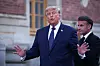 U.S. President Donald Trump speaks as he arrives to attend a dinner hosted by French President Emmanuel Macron and his wife, Brigitte Macron at the Palace of Versailles near Paris, France, on June 17.
