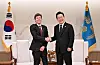 OpenAI CEO Sam Altman, left, shakes hands with Korean President Lee Jae Myung at then-presidential office in central Seoul on Oct. 1, 2025.