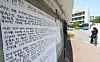 A hand-written statement condemning the June 3 election management is posted on a billboard in a college in Seoul on June 9.