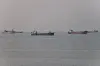 Vessels in the Strait of Hormuz near the beach of Bandar Abbas, Iran, on June 21.