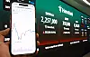 A mobile device displays a trading status of chipmaker's single stock-leveraged ETF at a bank in central Seoul on May 27.