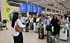 A group of foreign travelers arrives at Incheon International Airport in May.