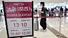 A notice of check-in hours for a flight bound for Kansai International Airport in Osaka is seen at Gimpo International Airport in western Seoul on June 23.