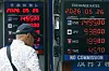Exchange rates are displayed on an electronic board in central Seoul on May 26.