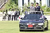 Korean Defense Minister Ahn Gyu-back, left and Japanese Defense Minister Shinjiro Koizumi stands on a vehicle during a military ceremony held in Yongsan District, central Seoul, on June 28.