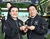 Korean Defense Minister Ahn Gyu-back and Japanese Defense Minister Shinjiro Koizumi holds an aircraft model at Black Eagles' base in Gangwon on June 27.