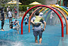 Children and adults frolic in a pool facility in eastern Seoul on June 28.